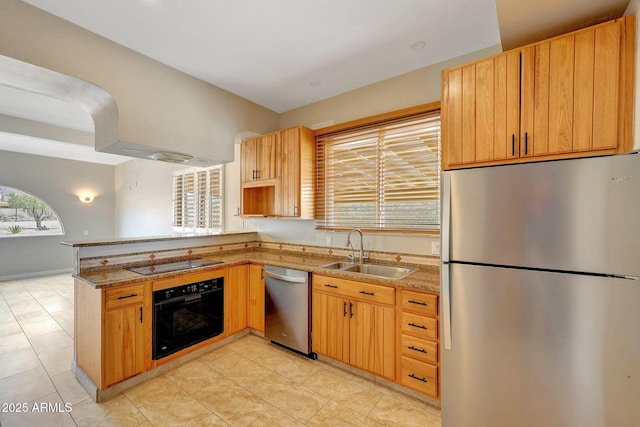 10239 N 125th St, Scottsdale, AZ 85259 - kitchen with black appliances, a sink, a peninsula, and light stone countertops