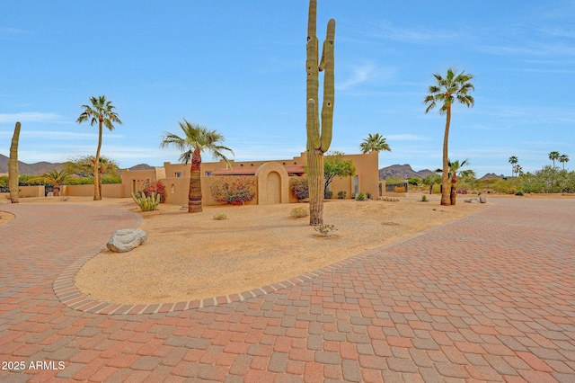 10239 N 125th St, Scottsdale, AZ 85259 - adobe home with fence, stucco siding, and a gate