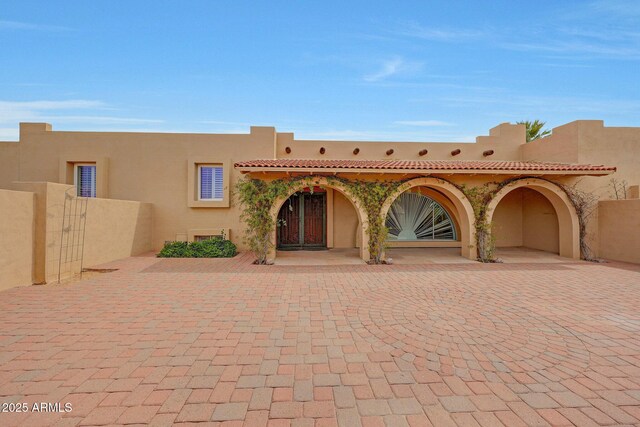 10239 N 125th St, Scottsdale, AZ 85259 - pueblo-style house featuring stucco siding