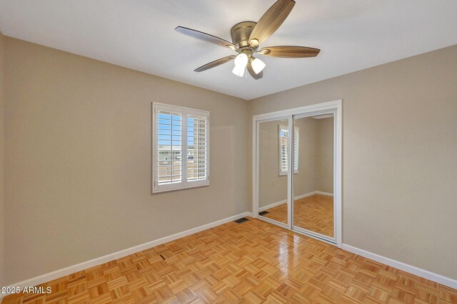 10239 N 125th St, Scottsdale, AZ 85259 - unfurnished bedroom featuring baseboards, a closet, and ceiling fan