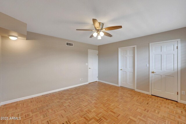 10239 N 125th St, Scottsdale, AZ 85259 - unfurnished bedroom with baseboards and a ceiling fan
