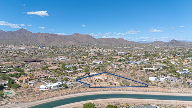 10239 N 125th St, Scottsdale, AZ 85259 - aerial overview of property's location featuring a mountain backdrop and property parcel outlined