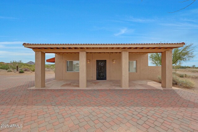 10239 N 125th St, Scottsdale, AZ 85259 - rear view of property with stucco siding and a patio area