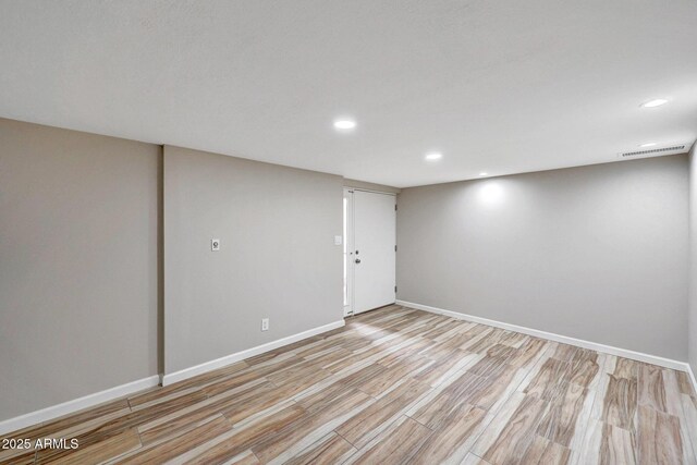 10239 N 125th St, Scottsdale, AZ 85259 - finished below grade area with recessed lighting, light wood-style flooring, and baseboards