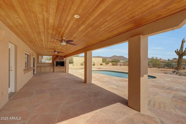 10239 N 125th St, Scottsdale, AZ 85259 - view of patio featuring a ceiling fan, exterior kitchen, and a fenced backyard