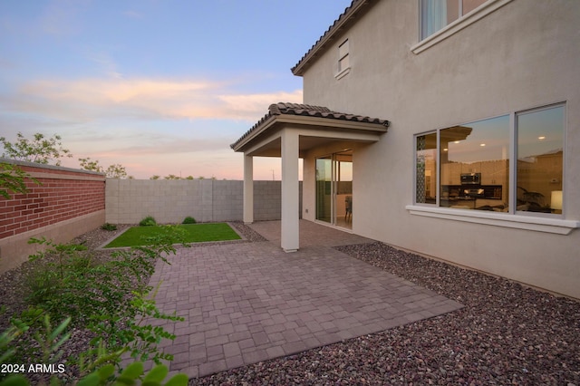 13259 N 145th Ln, Surprise, AZ 85379 - patio terrace at dusk featuring fence