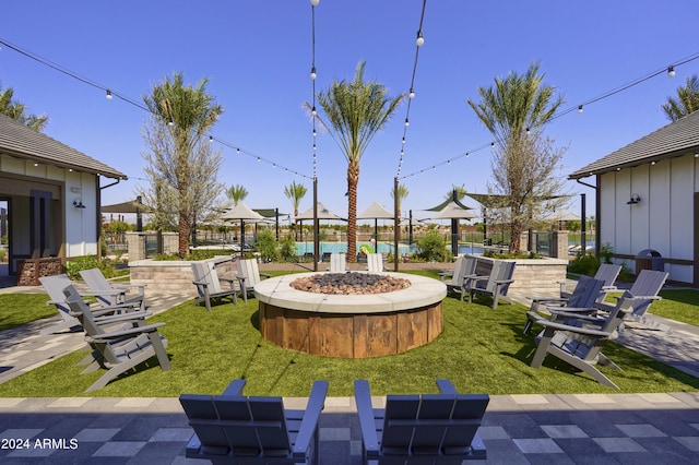 13259 N 145th Ln, Surprise, AZ 85379 - view of yard with an outdoor fire pit and fence