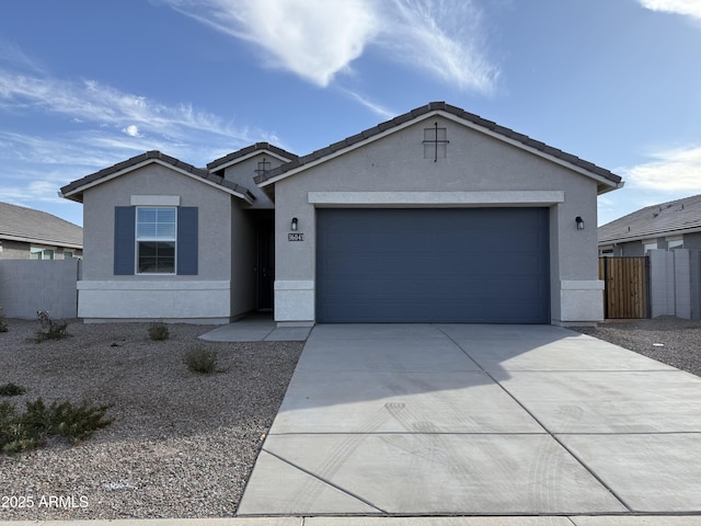 ranch-style home with a garage