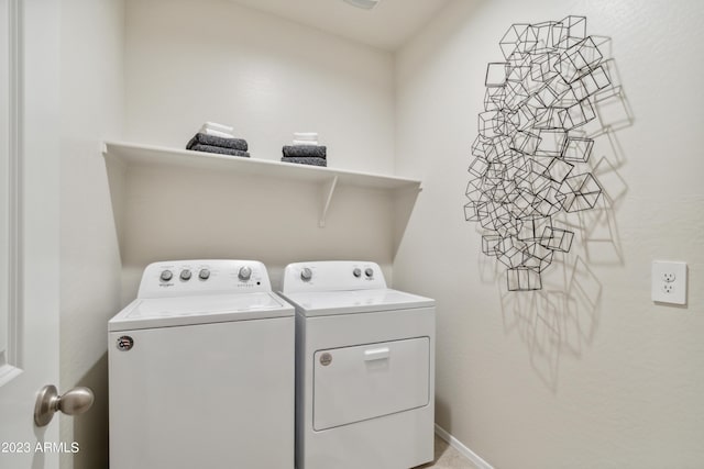 laundry room featuring washing machine and dryer