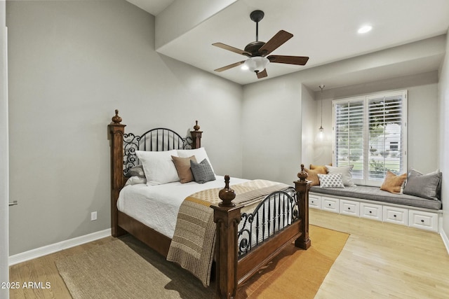 bedroom with recessed lighting, light wood-type flooring, a ceiling fan, and baseboards