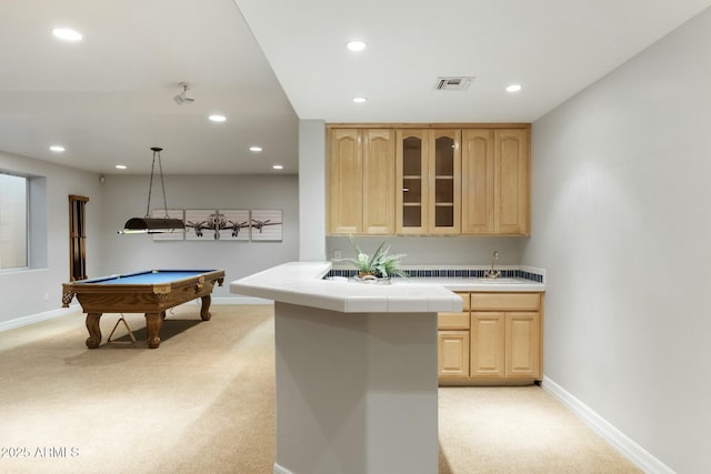 interior space featuring recessed lighting, visible vents, baseboards, and light colored carpet