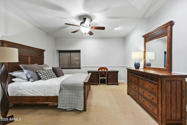 bedroom with light carpet and ceiling fan