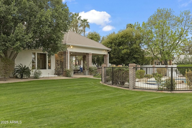 view of yard featuring a patio and fence