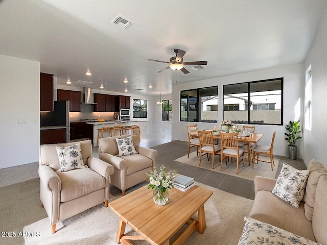 living room with ceiling fan