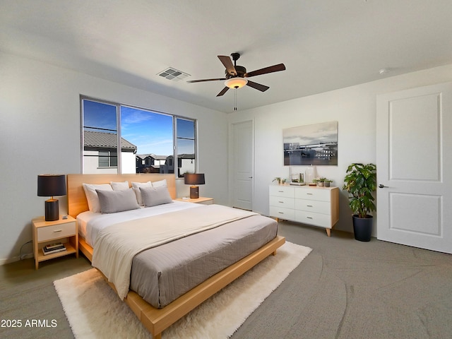 carpeted bedroom featuring ceiling fan