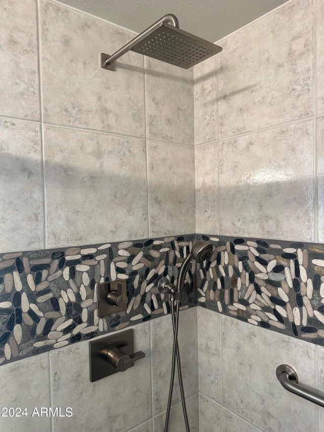 room details with a tile shower