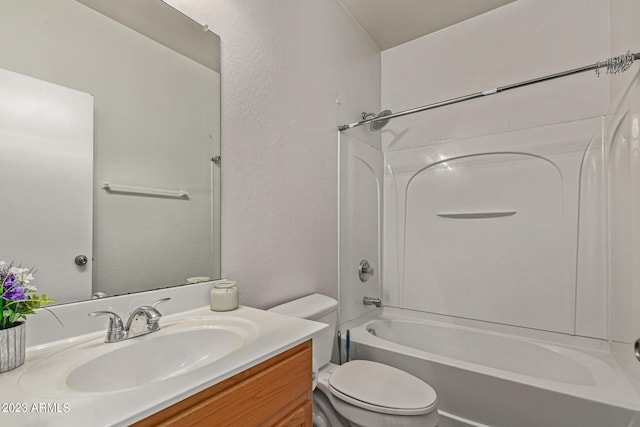 full bathroom with vanity,  shower combination, and toilet