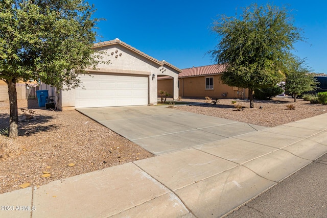 ranch-style home with a garage