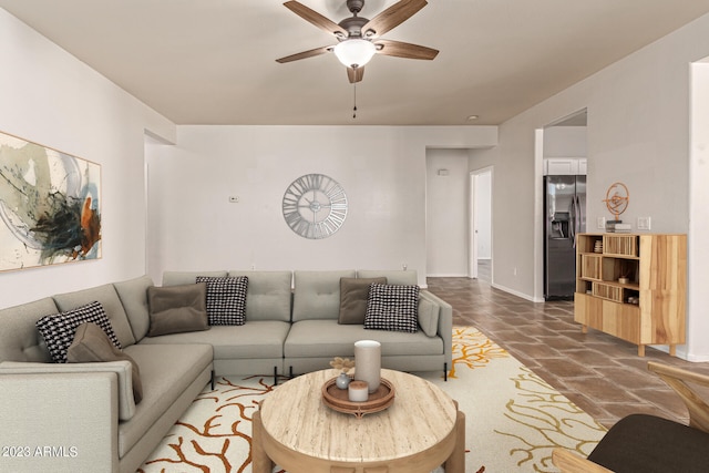 living room featuring ceiling fan