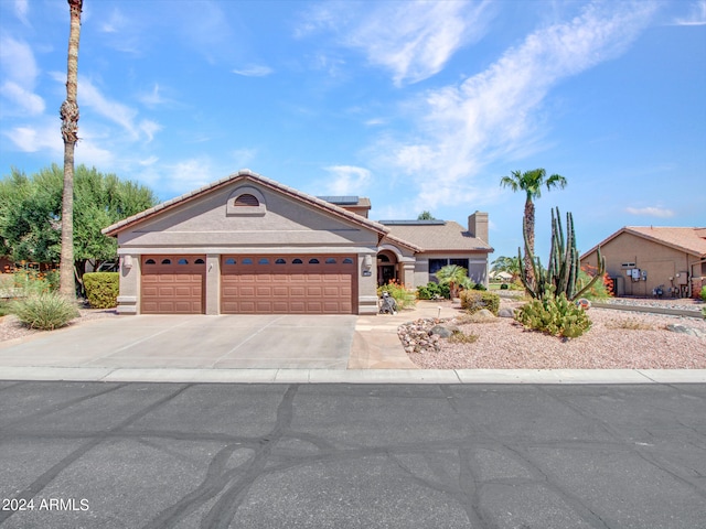 view of front of home featuring a garage