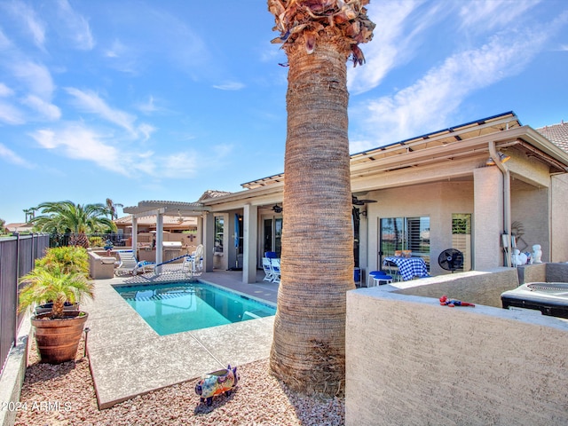 view of pool with a pergola and a patio area