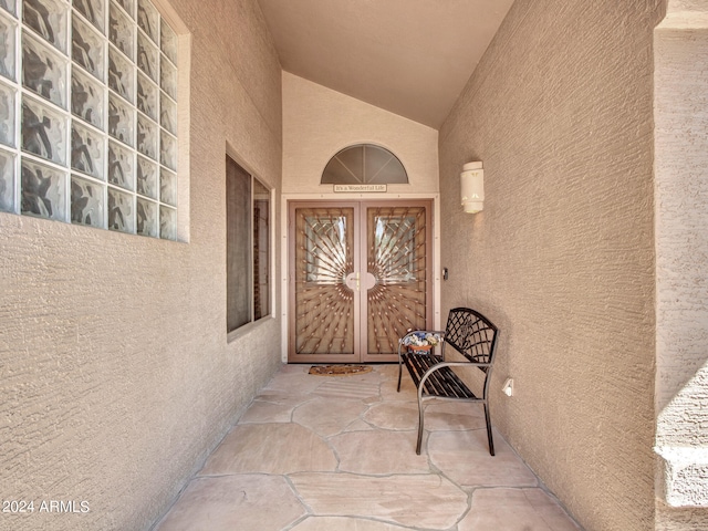 entrance to property featuring french doors