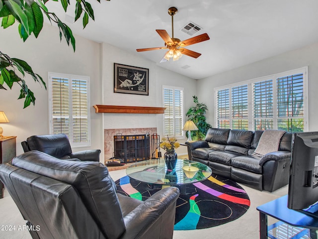 carpeted living room featuring lofted ceiling and ceiling fan