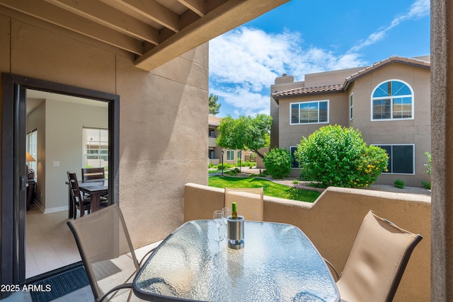 balcony featuring outdoor dining area