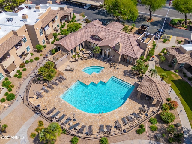 view from above of property with a pool area