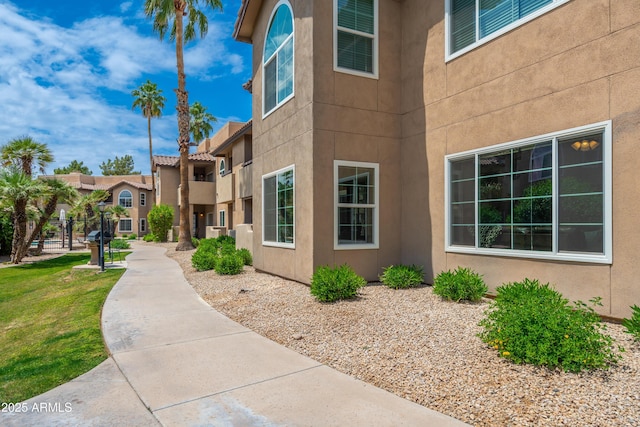 view of property exterior with stucco siding