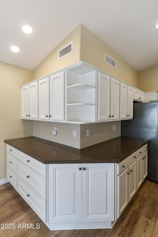 9216 E Rocky Lake Dr, Sun Lakes, AZ 85248 - kitchen with visible vents, white cabinets, and open shelves