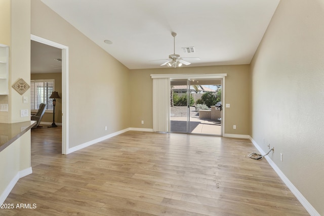 9216 E Rocky Lake Dr, Sun Lakes, AZ 85248 - unfurnished room featuring a ceiling fan, visible vents, baseboards, and light wood-style floors