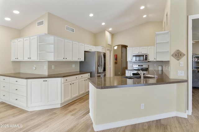 9216 E Rocky Lake Dr, Sun Lakes, AZ 85248 - kitchen featuring visible vents, stainless steel appliances, and open shelves