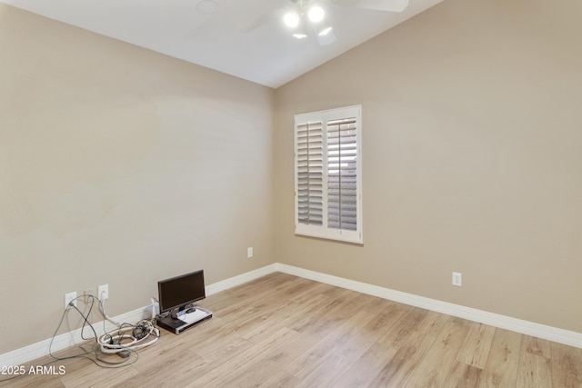 9216 E Rocky Lake Dr, Sun Lakes, AZ 85248 - empty room with ceiling fan, baseboards, vaulted ceiling, and light wood-style floors