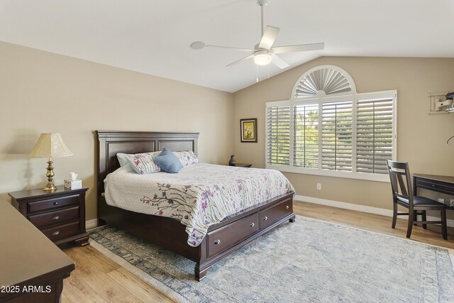9216 E Rocky Lake Dr, Sun Lakes, AZ 85248 - bedroom featuring ceiling fan, light wood finished floors, vaulted ceiling, and baseboards