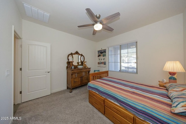 bedroom featuring ceiling fan and light colored carpet