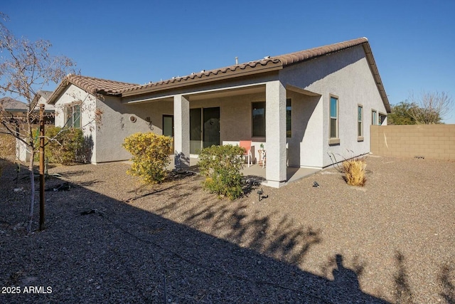 back of house featuring a patio area