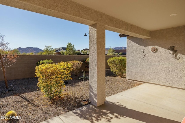 view of patio featuring a mountain view