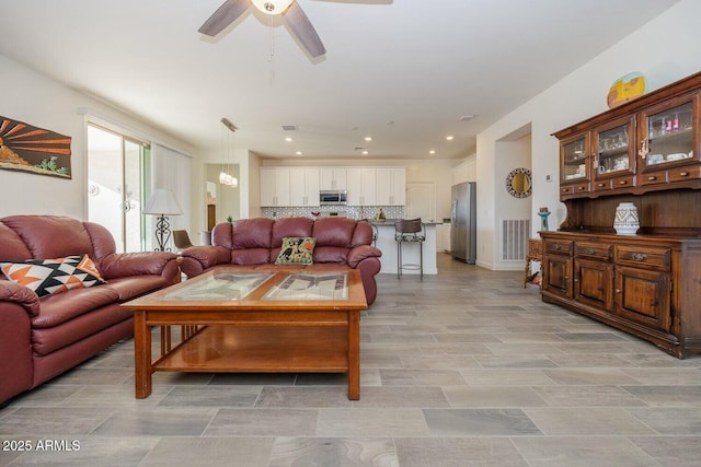 living room with ceiling fan