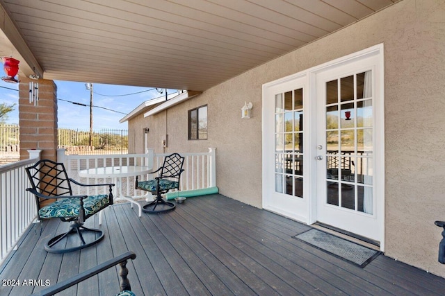 wooden terrace featuring french doors