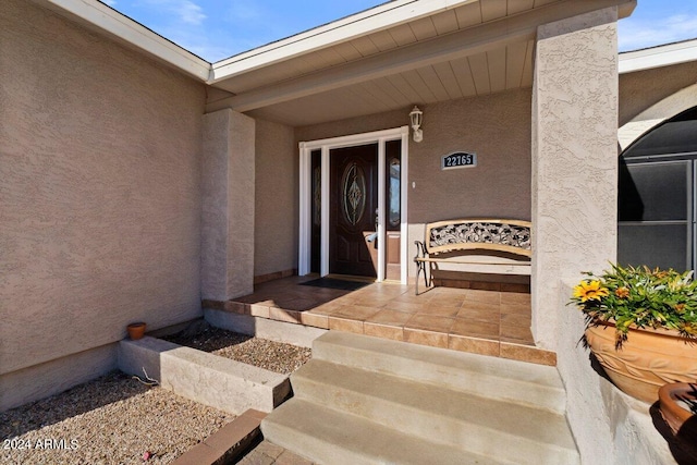 property entrance with a porch