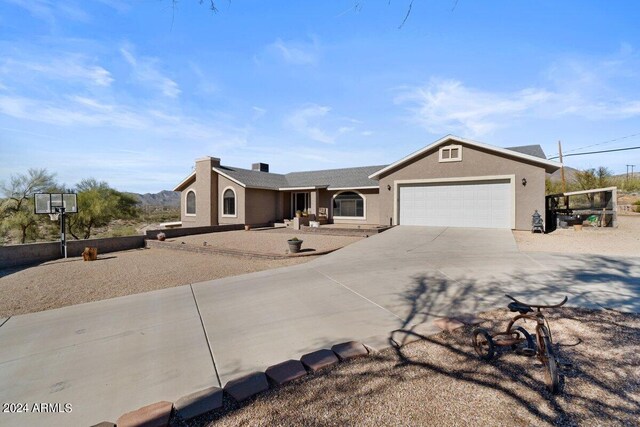 ranch-style home with a garage