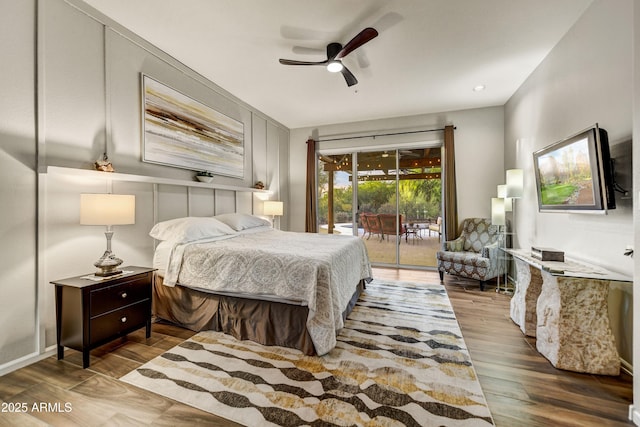 7304 E Bent Tree Dr, Scottsdale, AZ 85266 - bedroom with access to outside, wood finished floors, and ceiling fan