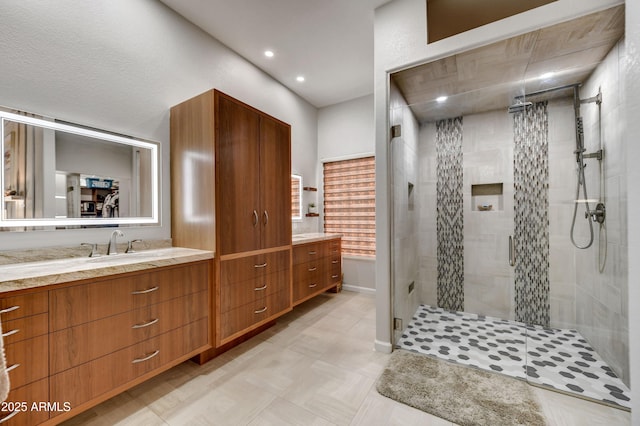 7304 E Bent Tree Dr, Scottsdale, AZ 85266 - full bath featuring double vanity, a stall shower, recessed lighting, and baseboards