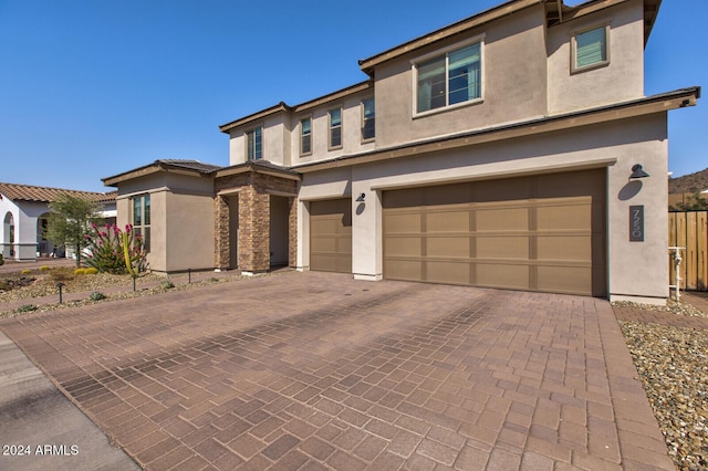 view of front of home with a garage