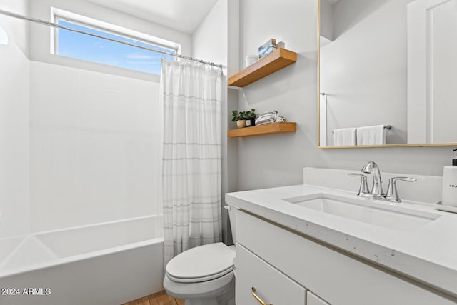 full bathroom with toilet, vanity, and shower / bathtub combination with curtain