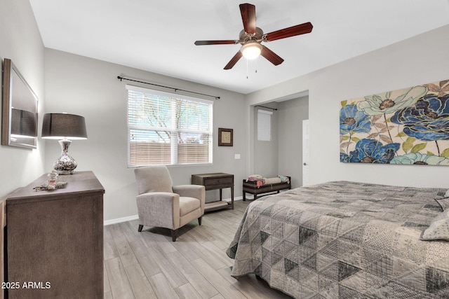 bedroom featuring ceiling fan and light hardwood / wood-style floors