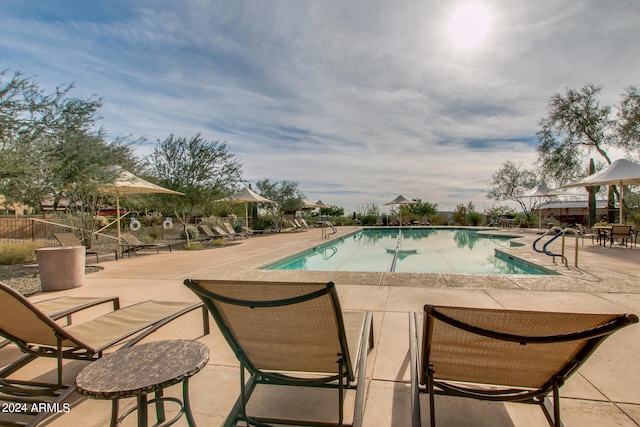 view of pool featuring a patio