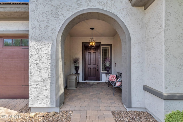 property entrance featuring a garage