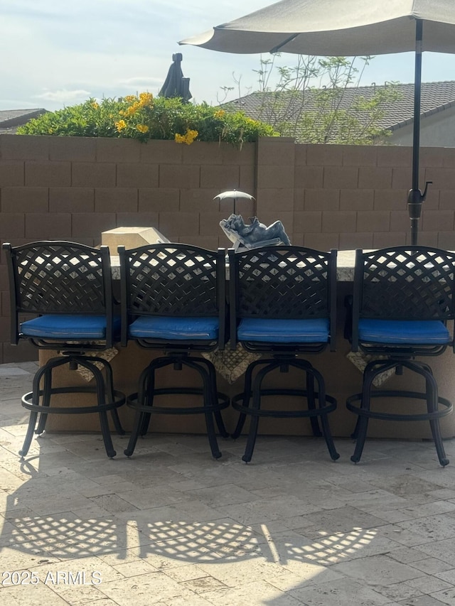 view of patio / terrace with fence